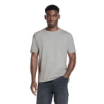 Male model wearing Men's Organic Cotton T-shirt in Light Heather Grey.