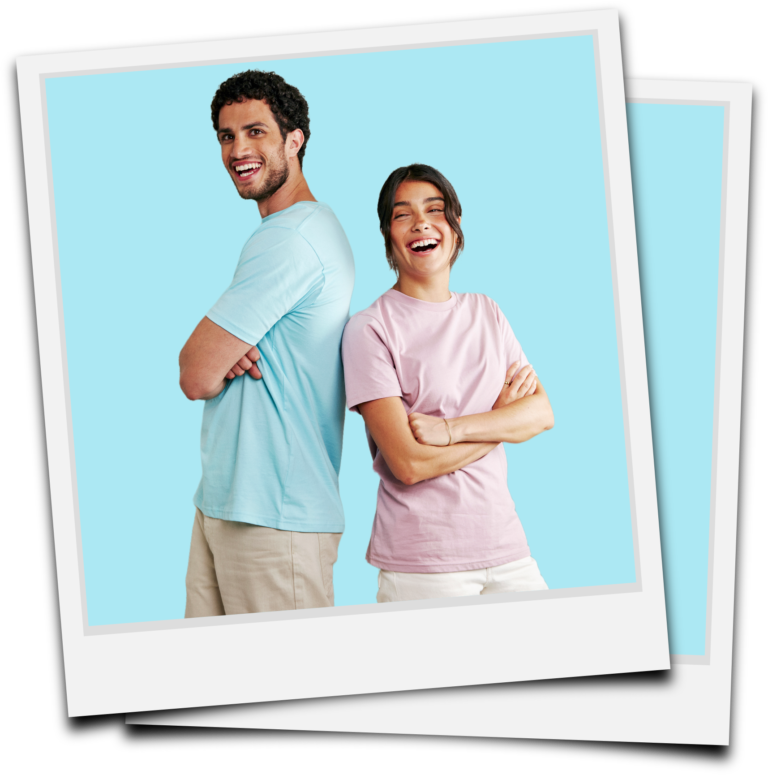 Two people laughing while wearing Fair Trade organic cotton t-shirts